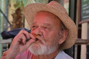 Portrait of old man smoking