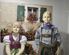 window decorations with children in costumes