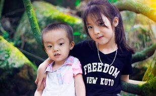 asian child girl and boy together, sister and brother