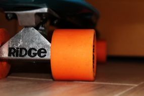 skateboard on orange rolls