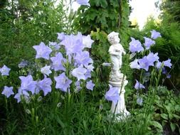 little boy, park statue in bell flowers