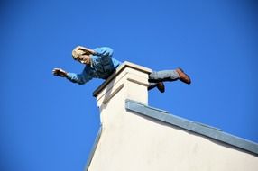 male mannequin on the roof