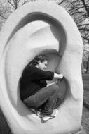 man in stone ears