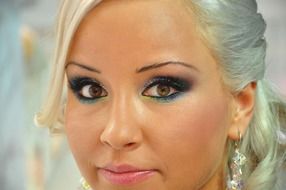 portrait of a blonde with colorful makeup