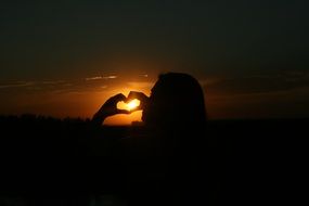 the heart of the fingers at sunset