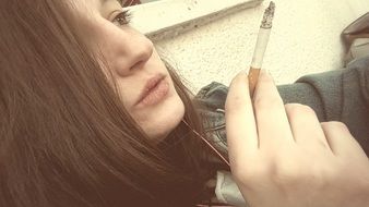 girl with a cigarette closeup