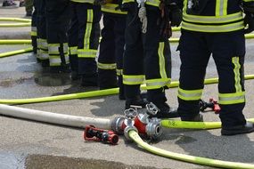 fire extinguishing firefighters in protective clothing