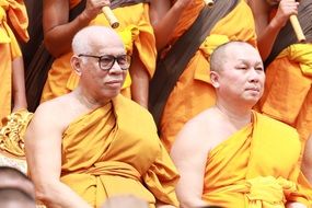 Buddhists in orange robes