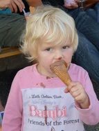 toddler eating chocolate ice cream