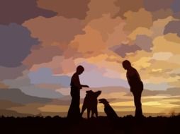 silhouettes of people and dogs at sunset