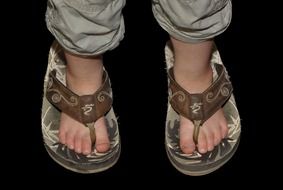 children's feet in sandals