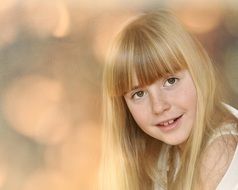 portrait of a beautiful girl with long blond hair
