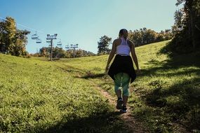 endurance of the active girl on the background of nature in the mountains