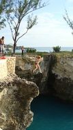 girl jumping in water