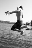 a photo of a teenager's jump into the water