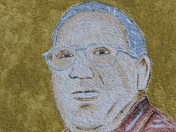 portrait of a man with glasses drawing