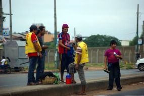 children on the outskirts of the road