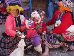 people in traditional costumes in peru