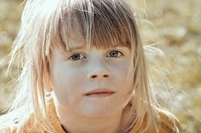 blond girl child face portrait
