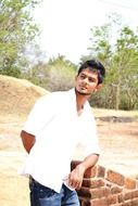 young man posing for a photo in Sri Lanka