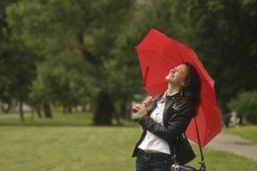 girl is photoshooting in the green park