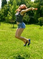 girl jumping for joy