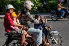 family on a motorcycle, indonesia, Bali