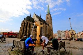modern people at the fountain, Czech Republic
