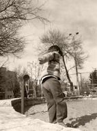 bouncing child in monochrome image