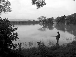 black and white picture of a fisherman