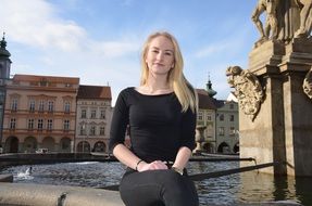 blonde Girl near the fountain