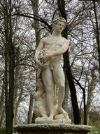 white antique sculpture in a park in Aranjuez, Spain