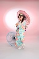 kimono girl ceremony umbrellas