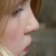 profile portrait of a pensive girl