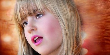girl with blond hair with pink lips