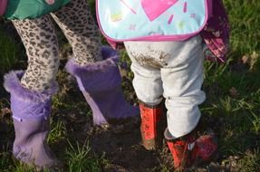 children in mud