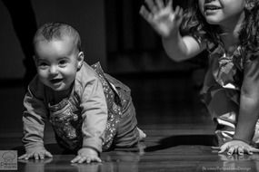 baby and child girl crawling, black and white
