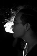 man smoke cigarette