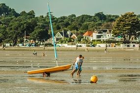 people at low tide at summer