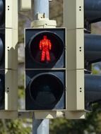 closeup view of red signal of a pedestrian traffic light