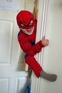 baby in a spiderman costume
