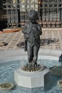 statue fountain little boy in santiago