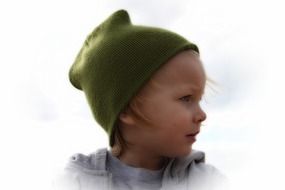 portrait of a child in a green hat