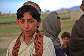 young boy in countryside in Afghanistan