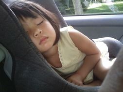 Sleeping child in the car