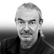 black and white photo of a man with a 3-day beard