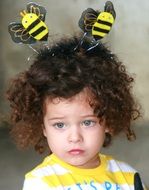 portrait of a child with curly hair
