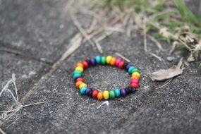 colored bracelet on the ground