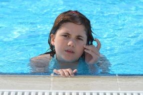 dark hair girl in swimming pool