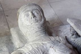 medieval figure in an ancient temple